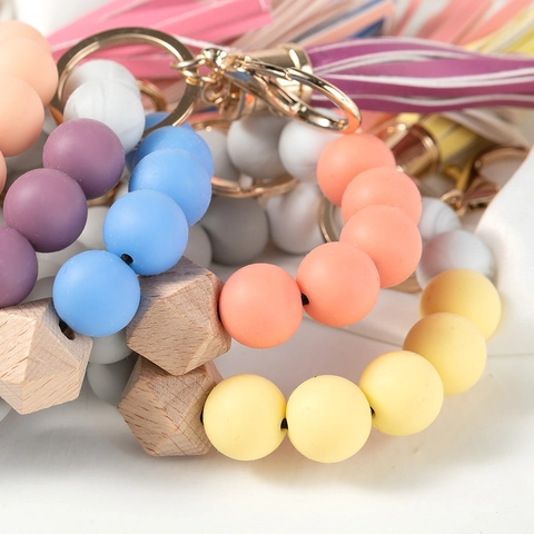 Silicone Beaded Bangle Keychain Bracelet With Leather Tassel Geometric Wood Bead Alloy Clasp Wristlet Key Ring For Women