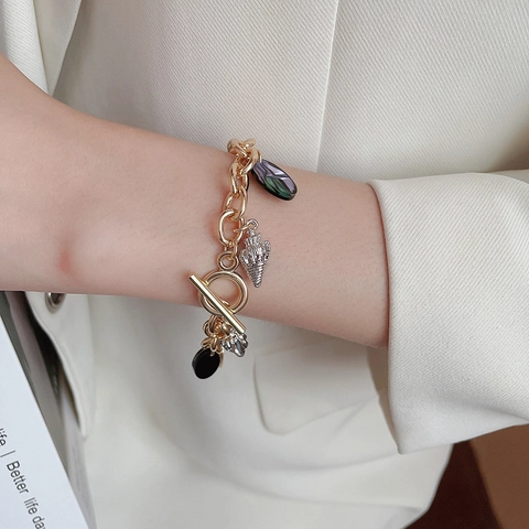 Pulsera Con Dijes De Océano Vintage Aleación Oro Estrella De Mar Concha Cierre De Palanca Cadena Gruesa Joyería De Nicho Vacaciones