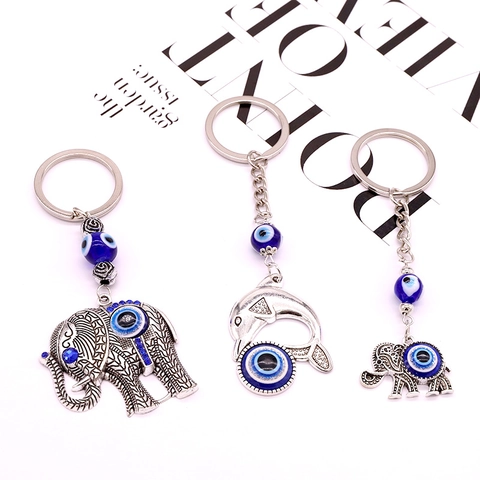 Porte-clés Rétro Style Ethnique Argent Antique Éléphant Dauphin Avec Charme Œil de Mauvais en Résine Décoration Animal Femme Homme