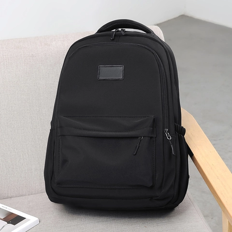 Mochila Casual Minimalista De Gran Capacidad Nylon Repelente Al Agua Bolsa Escolar Con Compartimento Para Portátil Para Estudiantes