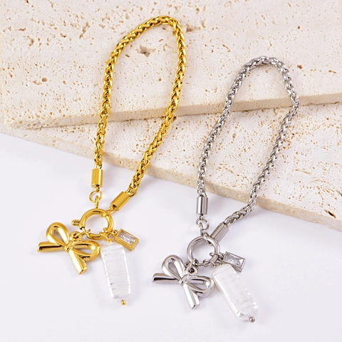 Pulsera de Acero Inoxidable con Lazo a la Moda para Mujer Bañada en Oro y Plata con Perla Artificial Barroca y Diamantes de Imitación