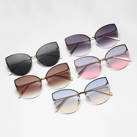 Occhiali Da Sole Oversize Occhio Di Gatto Alla Moda Senza Montatura In Metallo Lenti PC Protezione UV400 Per Donne