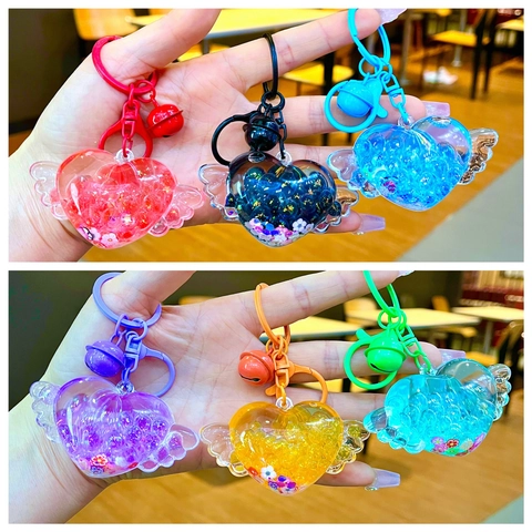 Simpatico Portachiavi a Forma di Cuore con Ali Sabbie Mobili Luminoso in Acrilico Pendente per Borsa con Campanello Regalo