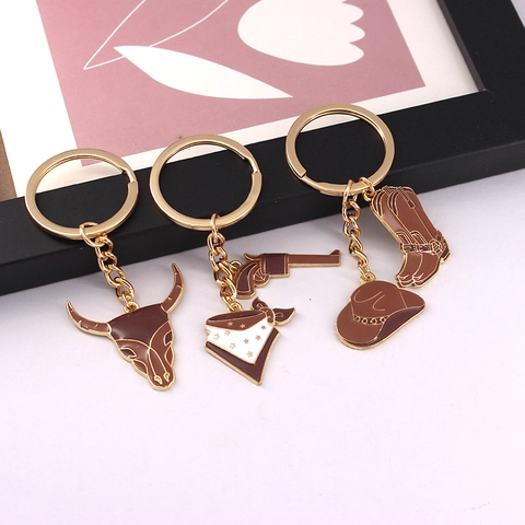 Western Cowboy Keychain Enamel Zinc Alloy Cowboy Hat Boots Bull Skull Revolver Bag Pendant Decorative Accessory