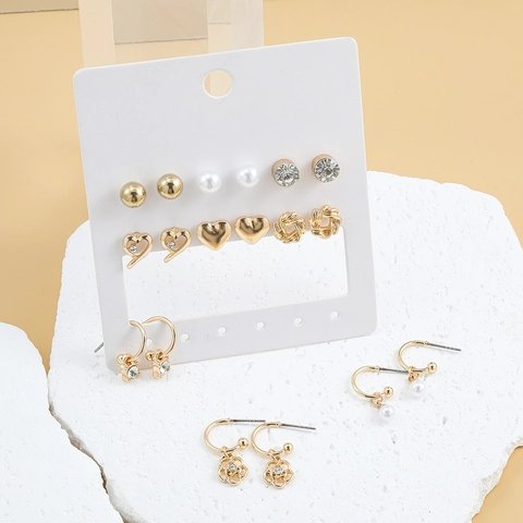 Pendientes Moda Aleación Perla Artificial Imitación Diamante Corazón Flor Geométrico Pendientes Botón Aro Con Poste Acero Inoxidable