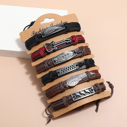 Bracciale In Pelle Intrecciata Retrò Ciondoli In Lega Ala Chitarra Piuma Punk Bohémien Multistrato Regolabile Unisex