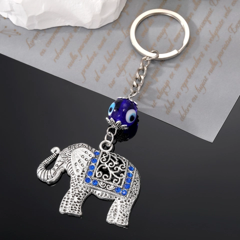 Retro Ethnic Hollow Elephant Keychain With Blue Rhinestone Evil Eye Charm Alloy Metal Animal Bag Pendant For Women Gift