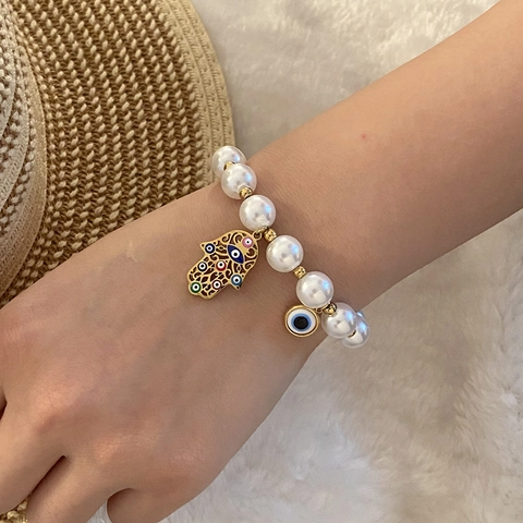 Bracelet À Künstliche Perles Evil Eye Hamsa Hand Imitation Künstliche Perle Acier Inoxydable Bijoux De Style Vacances Pour Femmes