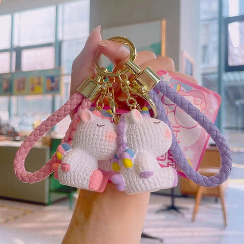 Porte-clés Licorne Dessin Animé Figurine En Résine Avec Dragonne En Cuir PU Tressé Charme De Sac Kawaii Texture Tricotée