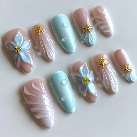 Uñas Postizas Tema Océano Azul Flores En Relieve Estrella De Mar Forma Almendra Plástico ABS Uñas Artificiales Estilo Elegante