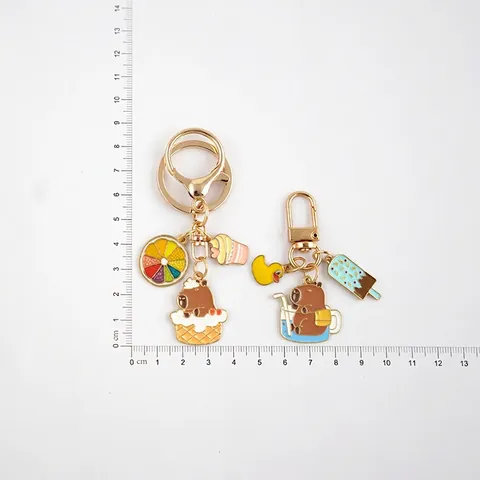 Llavero de Capibara de Dibujos Animados Lindo Animal Esmalte de Goteo Kawaii Oso Cobaya Colgante de Bolsa para Decoración de Mochila de Estudiantes