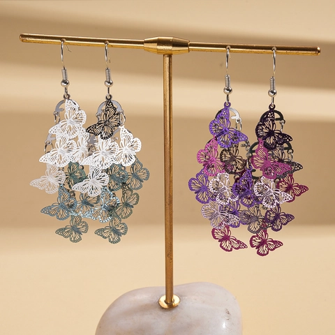 Hohle Schmetterling Hängeohrringe Eisen Metall Gestuft Farbverlauf Ethnisch Böhmisch Retro Stil Mode Accessoire Damen