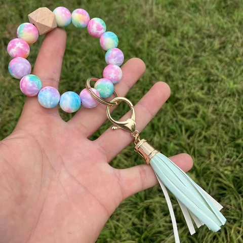 Llavero De Pulsera De Cuentas De Silicona Con Cuenta De Madera Y Borla De Cuero PU Patrón De Leopardo Girasol Para Mujer