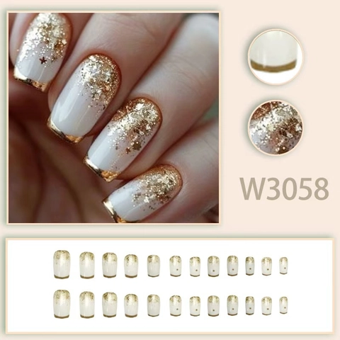 Faux Ongles À Presser Style Français Blanc Lait Avec Dégradé De Paillettes Dorées Design Étoile Luxe Pour Femmes