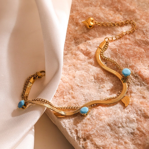 Pulsera de Doble Capa de Acero de Titanio a la Moda para Mujer Bañada en Oro con Cuentas de Strass Azules y Colgantes de Estrella y Hoja