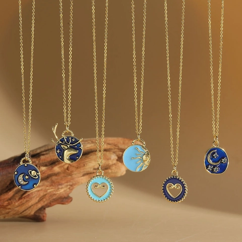 Collana con Pendente a Sole in Rame Zirconia Vintage Placcato Oro Smalto Blu Luna Stella Cuore Cervo Gioielli Donna