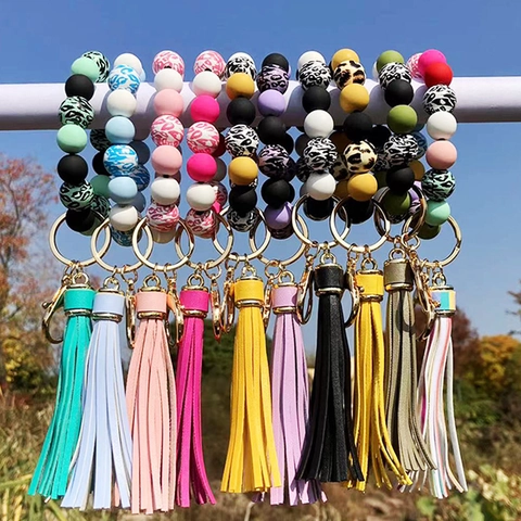 Bracelet Porte-Clés À Perles Imprimé Léopard Avec Perles En Silicone Et Pompon En Cuir PU Anneau Portable Pour Femmes