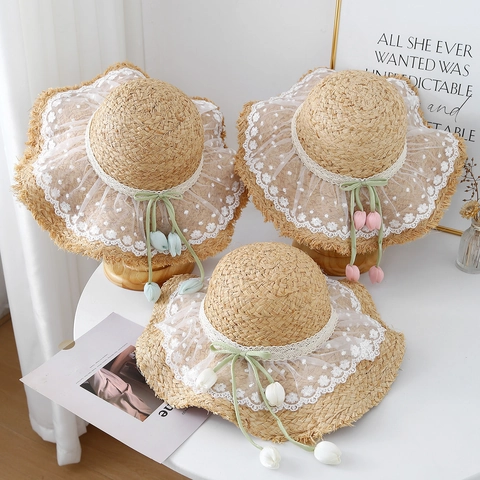 Women Straw Bucket Hat Large Brim Hand Woven Raffia Beach Sun Hat With Lace Mesh And Tulip Pendants Elegant Summer Travel