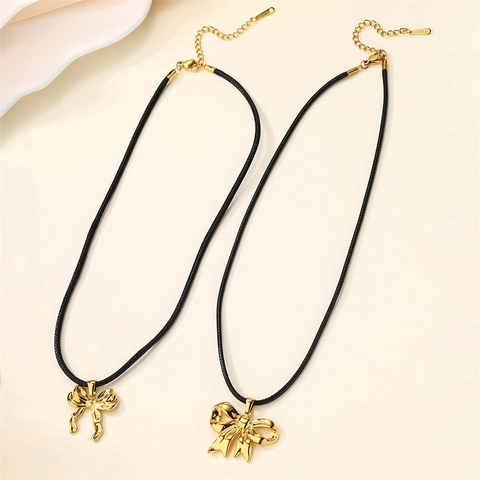 Collier Pendentif Nœud en Acier Inoxydable Plaqué Or 18K Avec Cordon Noir Bijoux de Mode Minimalistes pour Femme Quotidien