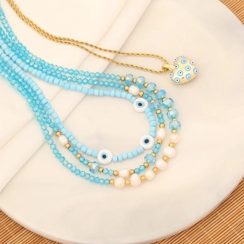 Handgefertigte Böser Blick Herz Anhänger Halskette Blaue Künstliche Kristallperlen Weiße Faux Künstliche Perle Mehrlagiger Boho Schmuck