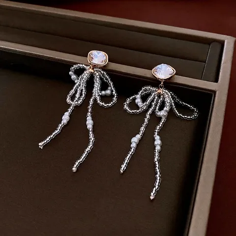 Orecchini Pendenti Con Fiocco E Nappine Lunghe Donna Rame Placcato Oro Perno In Argento Strass Perla Artificial Perline Elegante