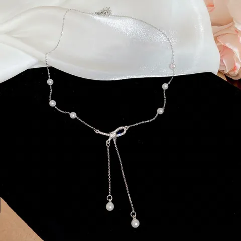 Elegante Halskette Mit Schleife Anhänger Legierung Strass Und Künstliche Perlenimitat Quaste Für Damen Im Französischen Stil