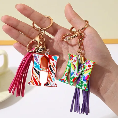 Alphabet Buchstabe Initialen Schlüsselanhänger Zinklegierung Blumenmuster Mit PU Leder Quaste Taschenanhänger Boho Stil
