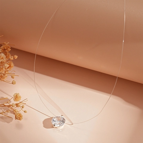 Collana Minimalista In Filo Da Pesca Invisibile Con Ciondolo Solitario In Zircone E Rame Effetto Fluttuante Per Donna
