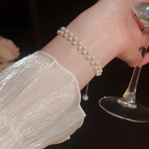 Elegante Bracciale Di Künstliche Perle A Doppia Fila Da Donna Rame Placcato Oro Design Intrecciato Fibbia Regolabile Stile Francese