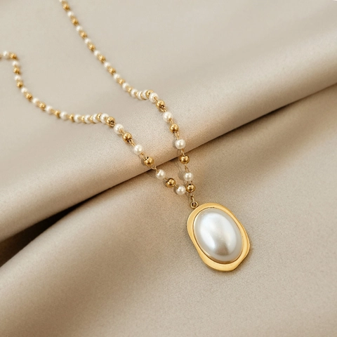 Elegante Collar y Pendientes con Colgante Ovalado de Acero de Titanio y Perla Artificial para Mujer Joyería Chapada en Oro