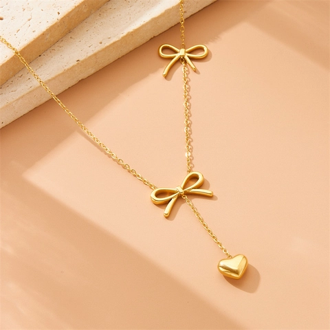 Collana In Acciaio Inossidabile Placcato Oro Elegante Forma A Y Fiocco Ciondolo A Cuore Per Donne