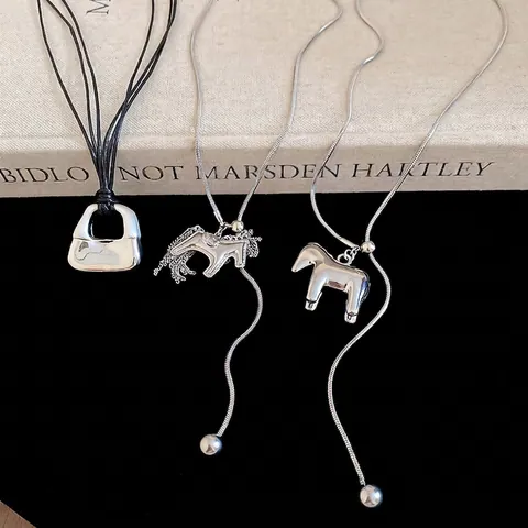Pendant Necklace Alloy Miniature Handbag Hollow Horse Design Long Chain Black Cord Creative Minimalist Fashion For Women