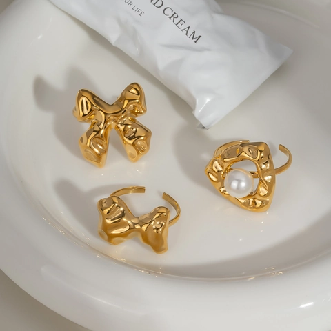 Stainless Steel Adjustable Open Rings Gold Plated Liquid Metal Lava Style Bow Design Artificial Pearl Accent For Women Waterproof