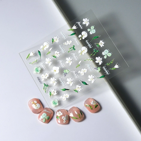 Stickers Art Ongles 5D Fleurs Blanches Feuilles Vertes Motifs 3D Autocollants Décoration Manucure Élégante Femmes