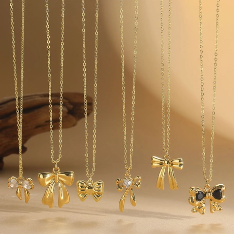 Collana con Pendente a Fiocco in Rame e Zirconia Minimalista Placcata Oro Catena della Clavicola a Farfalla Gioielli Donna