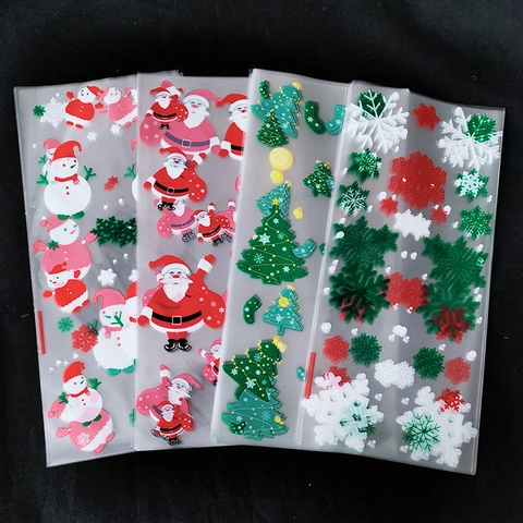 Sacchetti Regalo Di Natale Plastica OPP Trasparente Confezione Caramelle Biscotti Motivo Babbo Natale Pupazzo Di Neve Festa