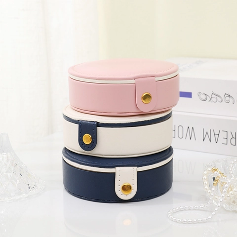 Boîte À Bijoux Ronde Cuir PU Organisateur Voyage Portable Avec Miroir Pour Bagues Boucles D'oreilles Colliers Doublure Velours