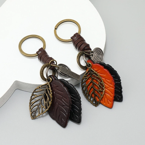Vintage Cowhide Leather Leaf Keychain Braided Bag Pendant Alloy Hollow Leaf Car Key Ring Retro Accessories Men Women Gift
