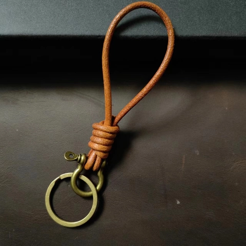 Porte-clés en Cordon de Cuir de Vache Fait Main Rétro Boucle de Fer à Cheval en Alliage de Zinc Anneau de Clé pour Voiture Pendentif de Sac