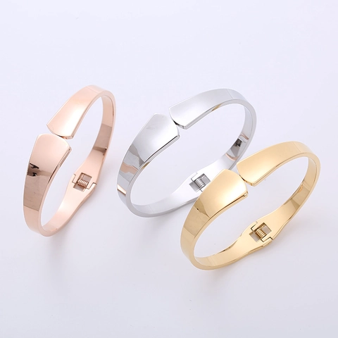 Bracciale Rigido Minimalista In Acciaio Inossidabile 304 Forma A Ventaglio Lucido Apertura A Molla Per Donne