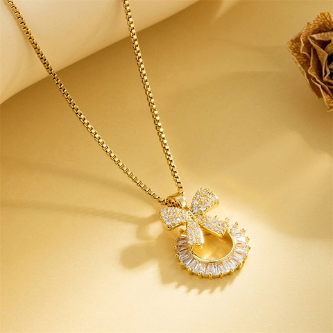Collana Con Pendente A Fiocco Acciaio Inossidabile Intarsiato Zircone Rhinestone Placcato Oro Per Donne