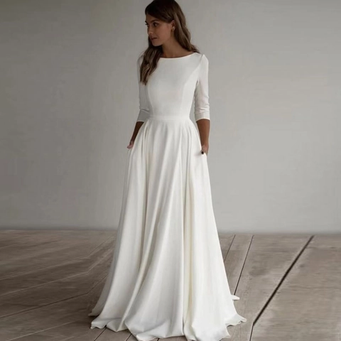 Minimalist Satin Wedding Dress Round Neck Long Sleeve A-Line Floor Length Bridal Gown With Pockets Elegant Simple