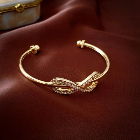 Vergoldeter Kupfer Offener Armreif Zirkonia Schleife Unendlichkeitssymbol Geometrischer Luxus Schmuck Für Damen