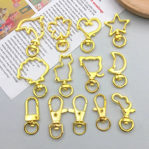 Moschettoni Girevoli In Lega Di Zinco Placcati Oro Novità Forme Luna Cuore Delfino Stella Ganci Per Portachiavi In Metallo DIY