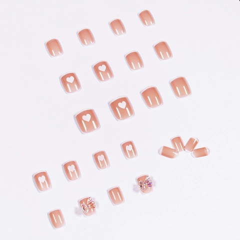 Unghie Press On French Tip Base Rosa Nude Cuori Bianchi Con Fiocco Iridescente 3D Stile Dolce Unghie Finte