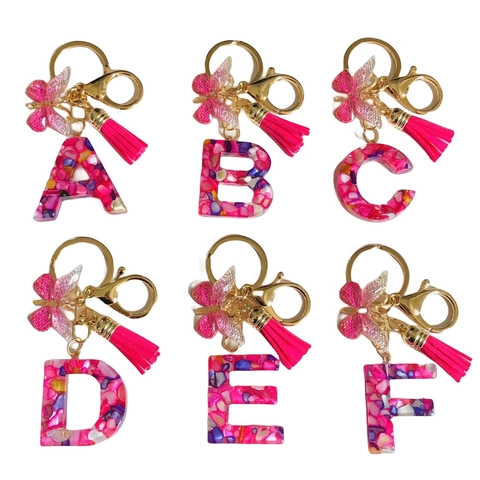 Portachiavi con Lettere dell'Alfabeto in Resina Moda con Nappa a Farfalla Rosa Lega Oro Ciondolo per Borsa Donna Ornamento