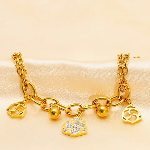 Bracciale A Doppio Strato In Acciaio Inossidabile Placcato Oro Rosa Con Fiore Di Camelia Traforato E Ciondoli In Zircone Donna