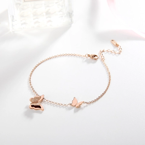 Bracciale a Doppia Farfalla in Acciaio al Titanio Oro Rosa da Donna Minimalista Raffinato Satinato Lucido Accessori Polso