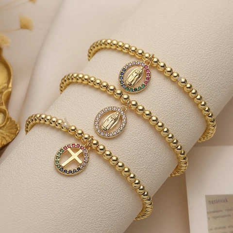 Bracciale Elastico In Rame Placcato Oro Con Ciondoli Religiosi Croce E Vergine Maria E Zirconi Colorati Gioielli Per Donna