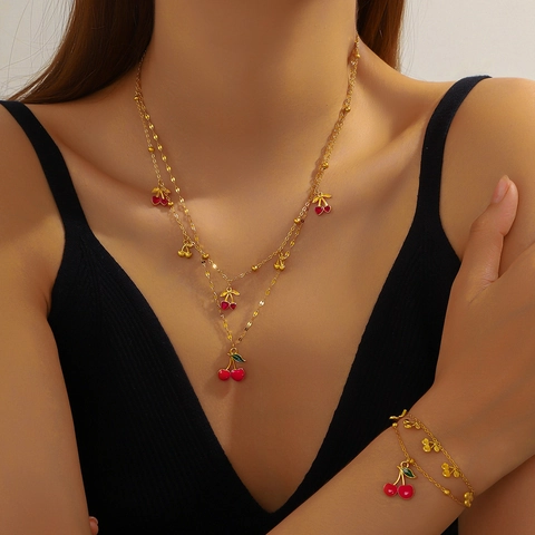 Gioielli Ciliegia Acciaio Inossidabile Placcato Oro Collana A Doppio Strato E Bracciale Frutta Smaltata Per Donne